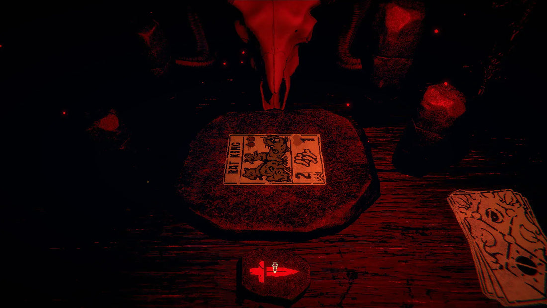 Rat king card on a table in a dark room
