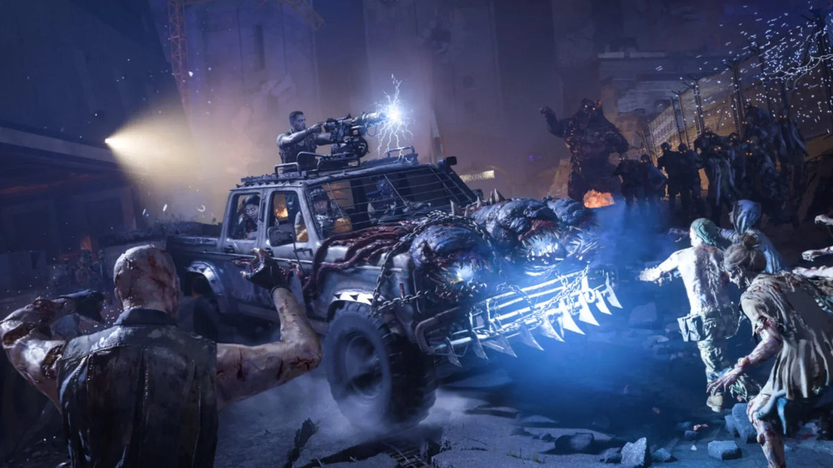 people in a truck fighting zombies