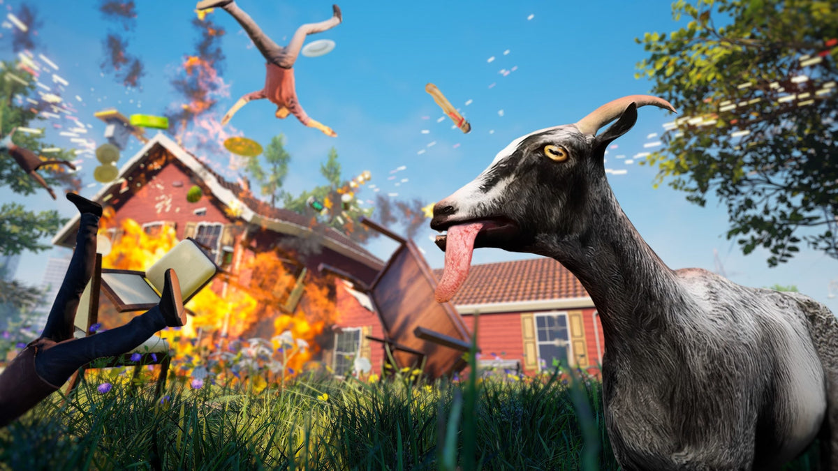 A gameplay screenshot from Goat Simulator showing a goat with its tongue out as a house explodes in the background with people and objects flying through the air.