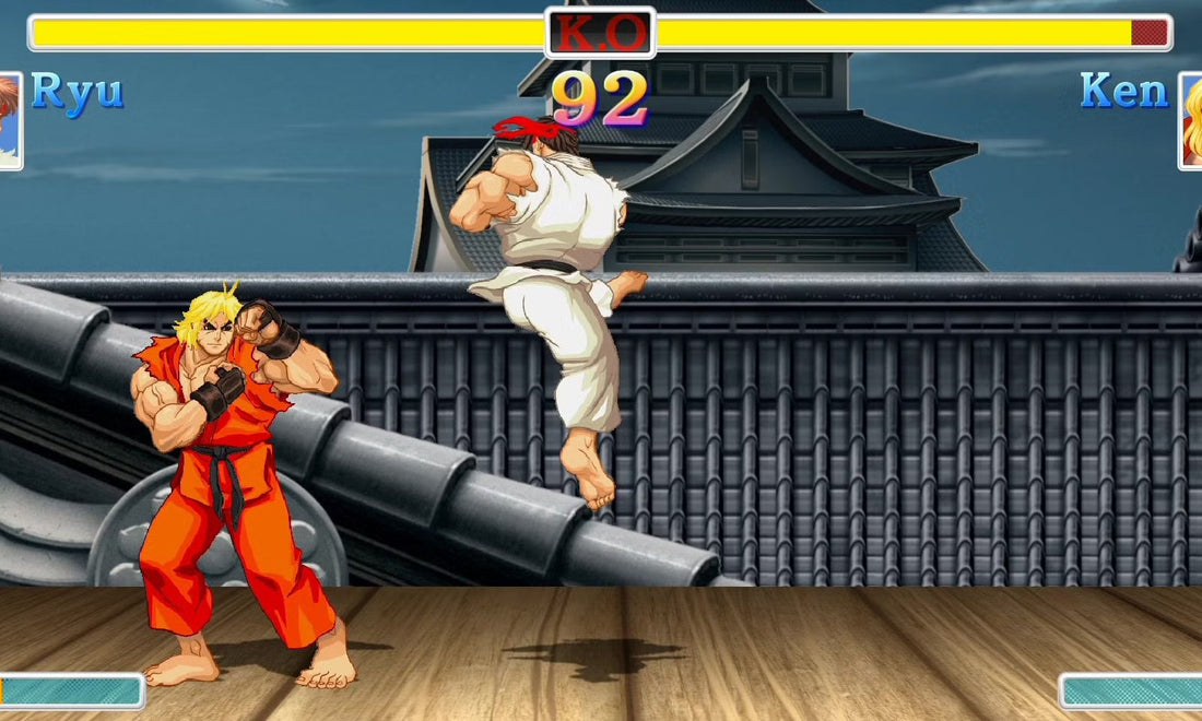 Ken faces Ryu mid-air in a Street Fighter-style game on a Japanese rooftop stage.