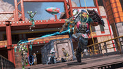 Futuristic shooter scene with armored characters battling around a supply crate, as one charges forward with electric energy and others attack from different angles.