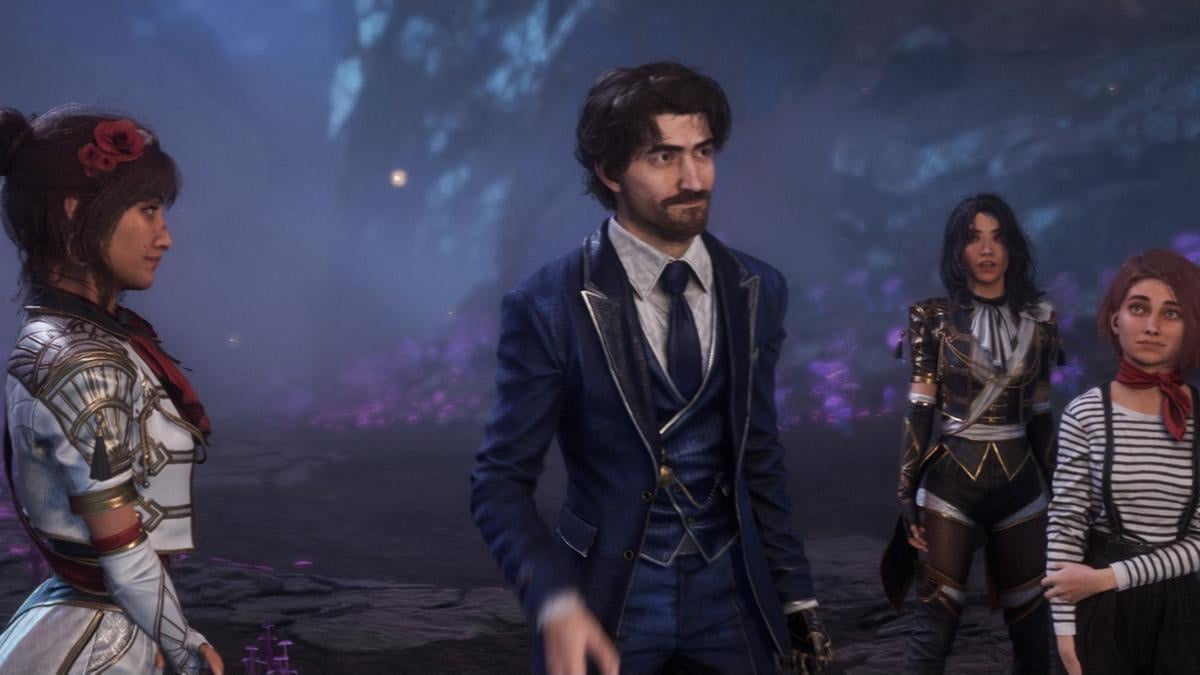 Four fantasy characters stand together in a glowing forest setting, including a man in a blue suit surrounded by companions in ornate adventure-themed outfits.