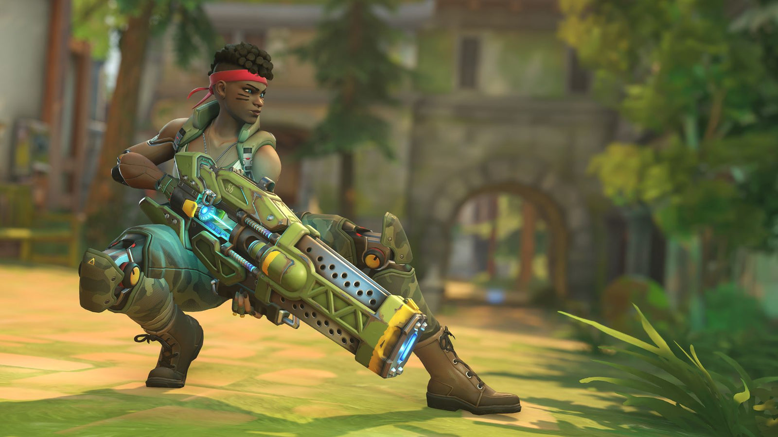 A video game character in green tactical armor holding a large futuristic weapon in an outdoor setting.