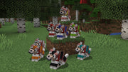 Minecraft wolves with different colored collars sitting together on grass blocks in a birch forest biome.