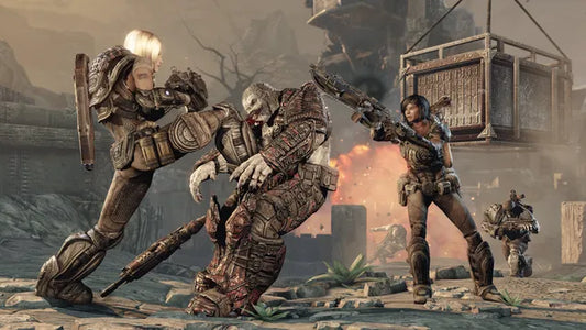 Two armored soldiers attack a hulking enemy in a ruined city, as one delivers a flying kick and the other fires a shotgun, with explosions and debris erupting in the background.