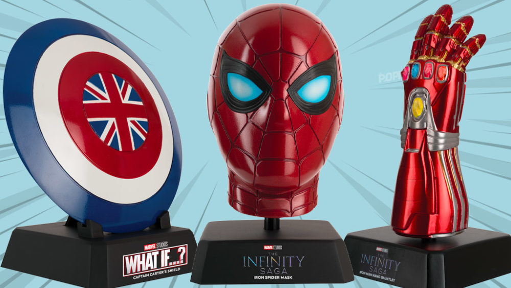 Marvel replica collectibles on display stands featuring Captain Carter’s shield, an Iron Spider mask, and an Iron Man nano gauntlet against a light blue background.