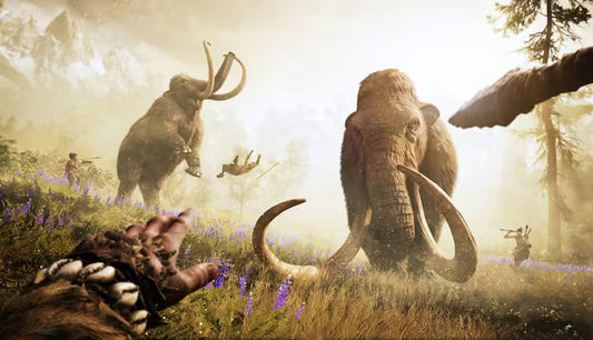 A primal hunt scene where mammoths charge across a field as hunters are thrown and scramble to survive.