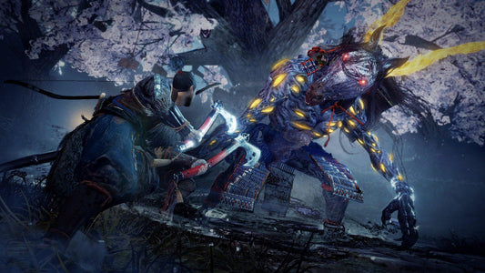 Nioh 2 gameplay screenshot showing samurai fighting glowing yokai enemy in dark forest environment