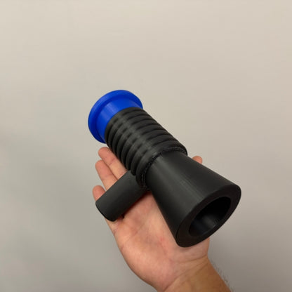 Brick style megaphone blaster replica held in hand showing size and grip of the 3D printed prop.