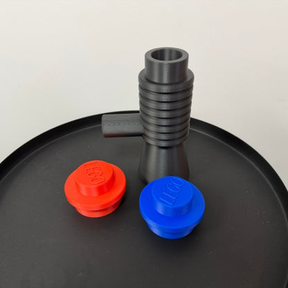 Brick style megaphone blaster replica with interchangeable red and blue top pieces.