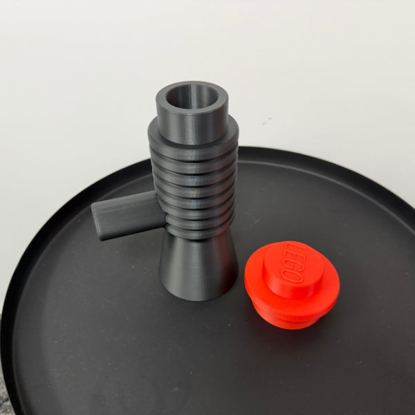 Brick style megaphone blaster replica body with red interchangeable top piece.