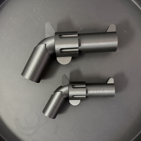 Large and small brick style revolver replicas displayed together showing available size options.