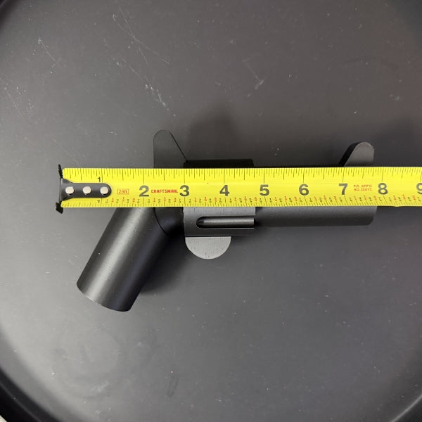 Brick style revolver replica with tape measure showing overall length of the prop.