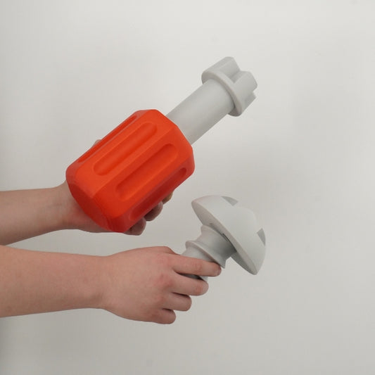 Lethal Company screw and screwdriver replicas held in hand showing the life size scale of the props.