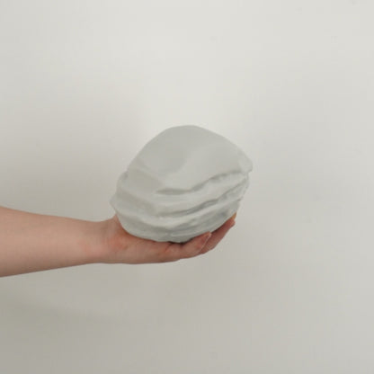 Rust Starter Rock replica held in hand showing the size of the 3D printed gaming prop.