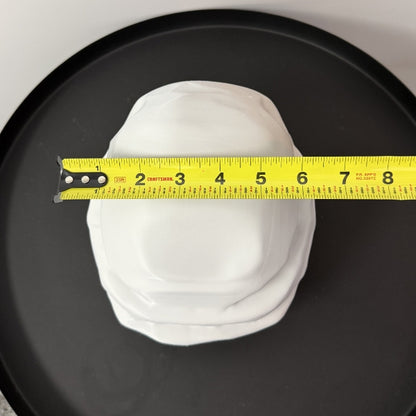 Top view of Rust Starter Rock replica with tape measure showing overall size of the prop.